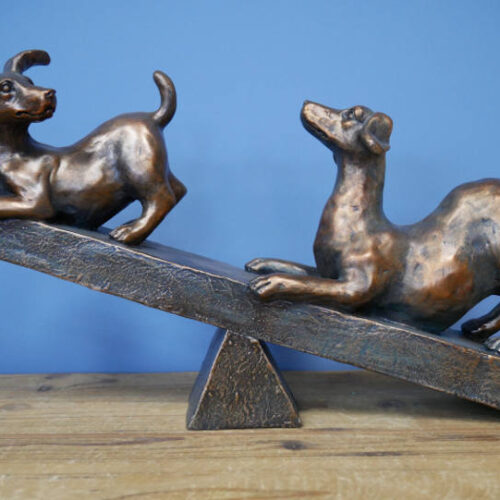 Dogs On A Seesaw
